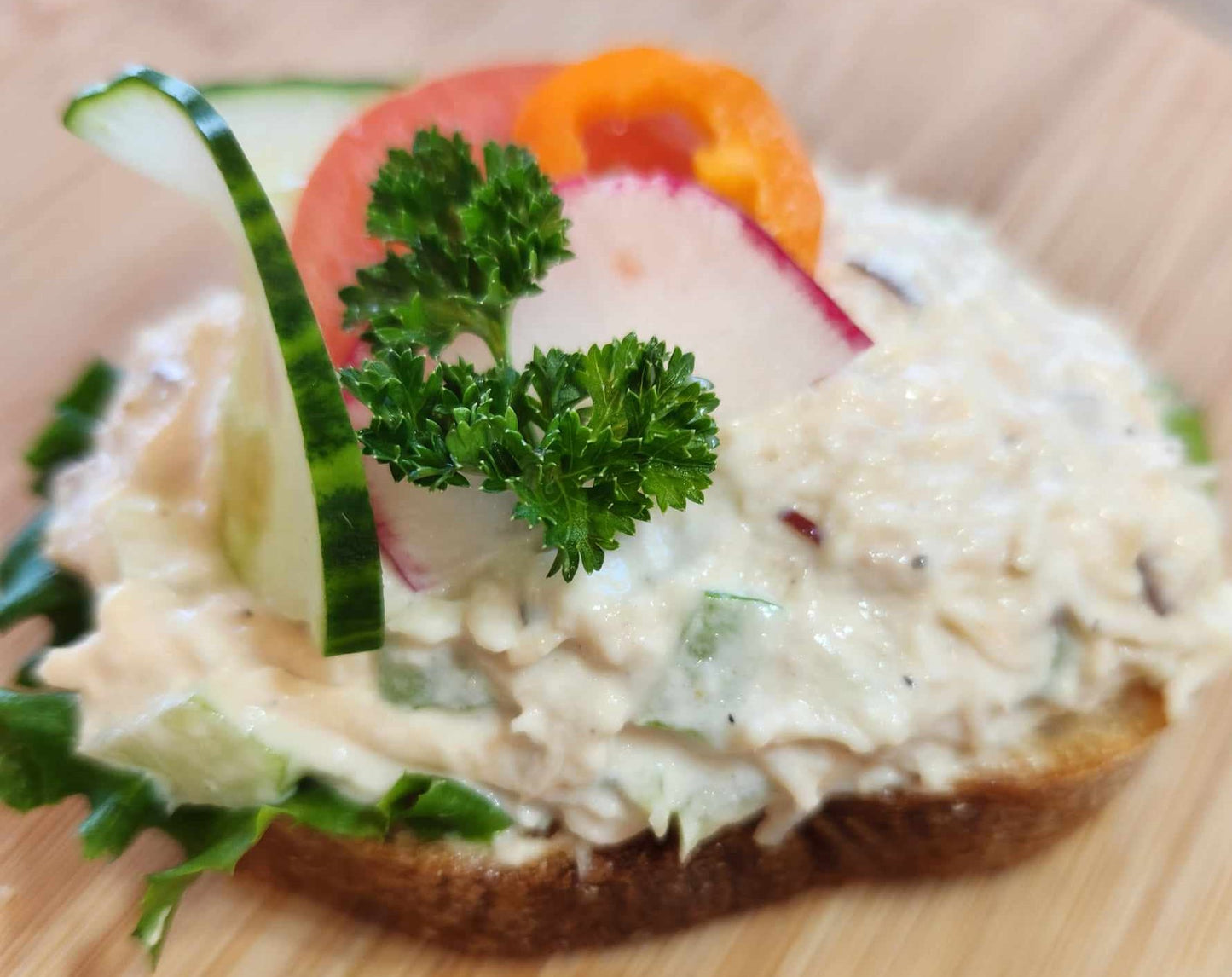 Chicken salad: sourdough bread, mayonnaise based chicken salad, vegetable garnish. Sold in quantities of 8 or 20 sandwiches. Mix and match in a box!